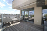 Fantastic penthouse with approx. 120 m² roof garden and water view - Lounge